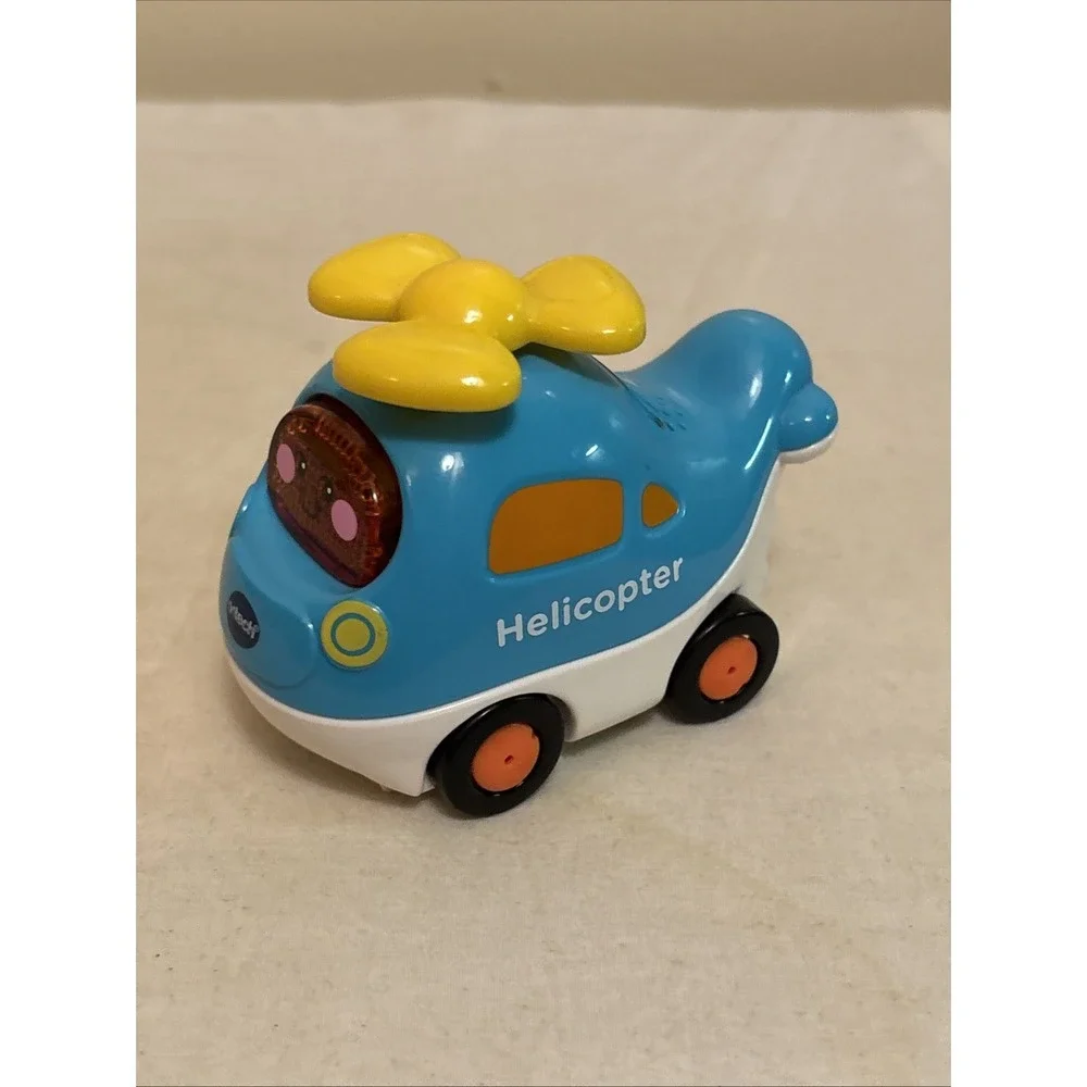 VTech Go! Go! Smart Wheels Lot of 4 Police Fire Tow Helicopter Toys